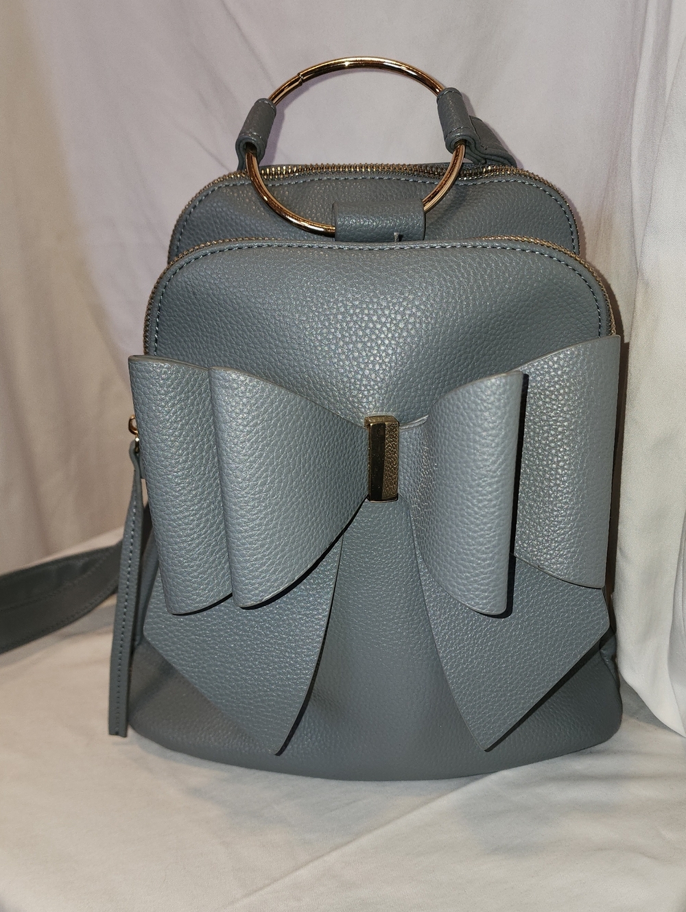 Crossi Women’s Blue/Gray Bow Accent Crossbody Backpack Bag